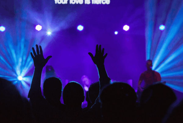 people worshipping in church service