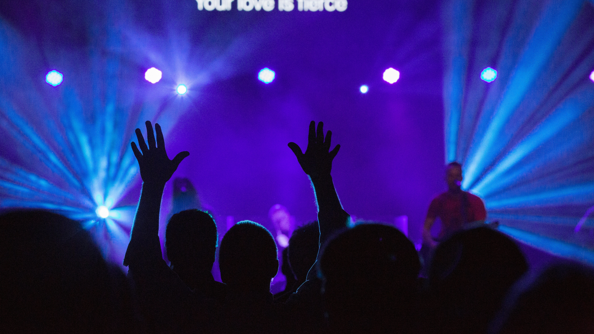 people worshipping in church service